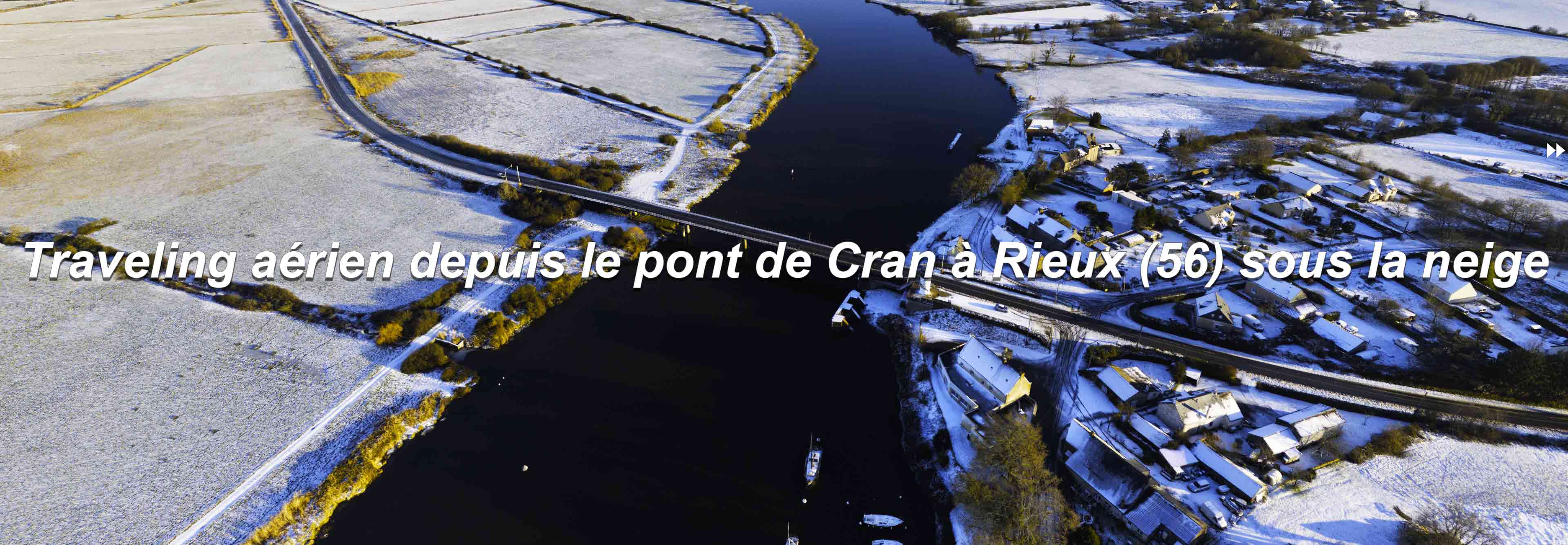 Traveling aérien depuis le pont de Cran à Rieux sous la neige - Janvier 2026